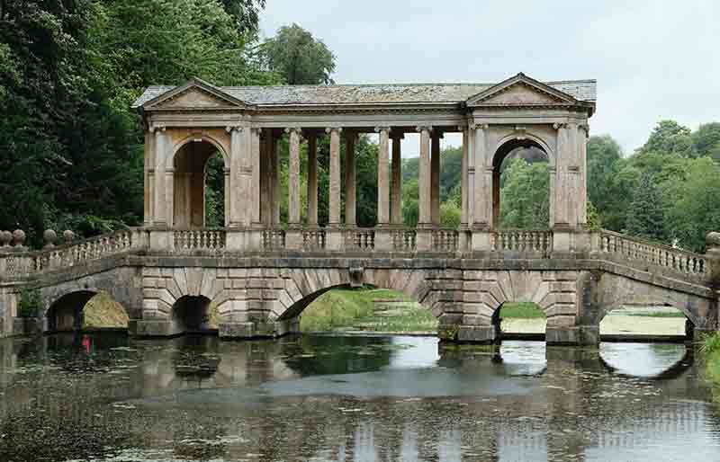 Palladian Bridge reflected in the water.