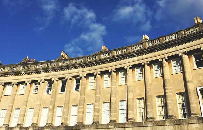 Yellow Bath stone façade with ionic columns.