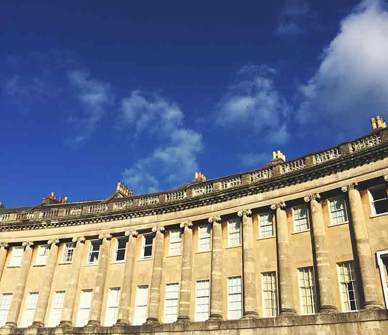 Yellow Bath stone façade with ionic columns.